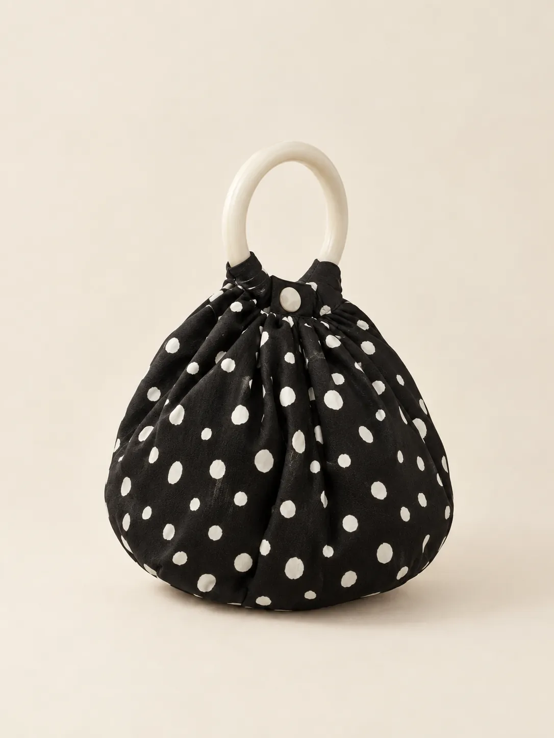 Ruched Dumpling Bag, from the side