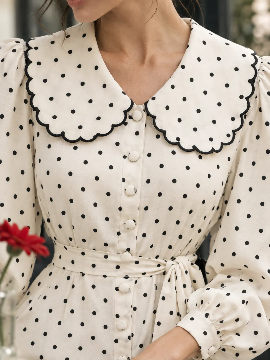 Scallop Collar Shirt Dress, close-up: the scalloped edge of the round collar and the covered buttons